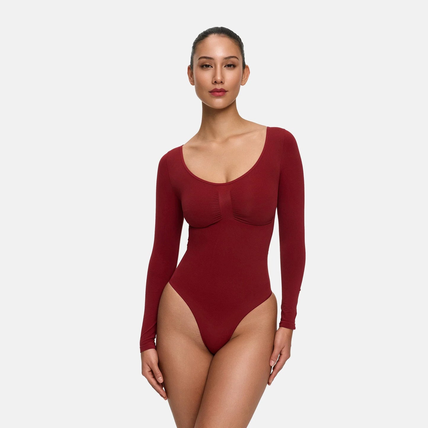 Body contenitivo modellante a maniche lunghe con slip